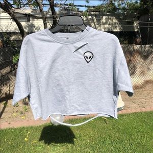 Grey crop top with alien logo